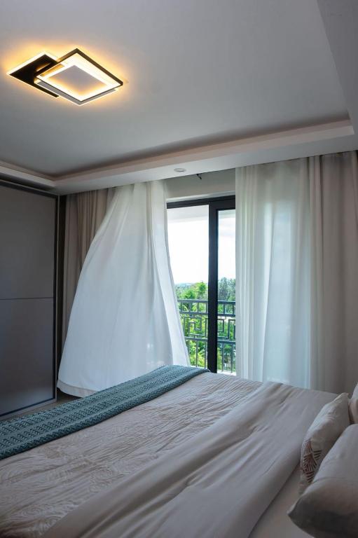 Voodi või voodid majutusasutuse Lumo residences toas