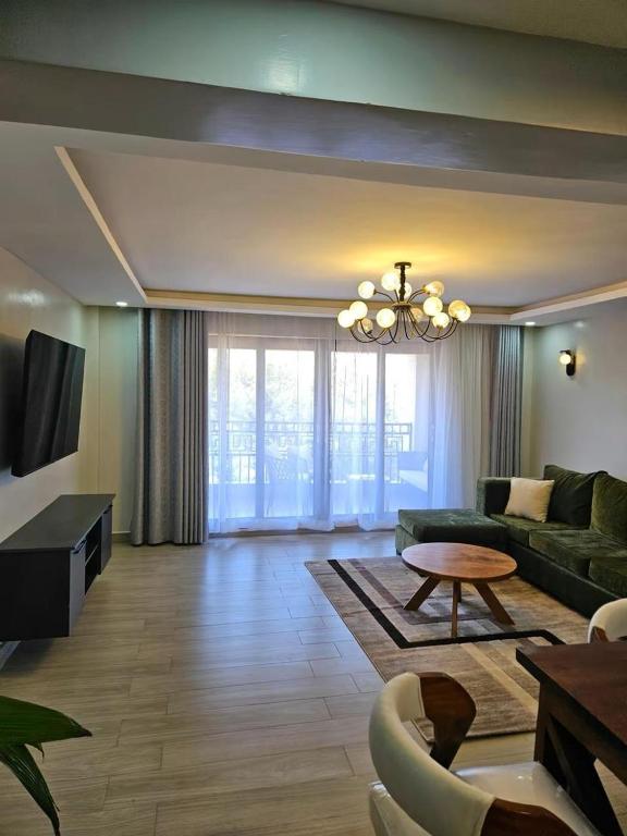 Televiisor ja/või meelelahutuskeskus majutusasutuses Lumo residences