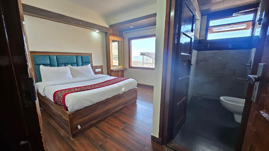 Postel nebo postele na pokoji v ubytování Hotel Pankaj Simla