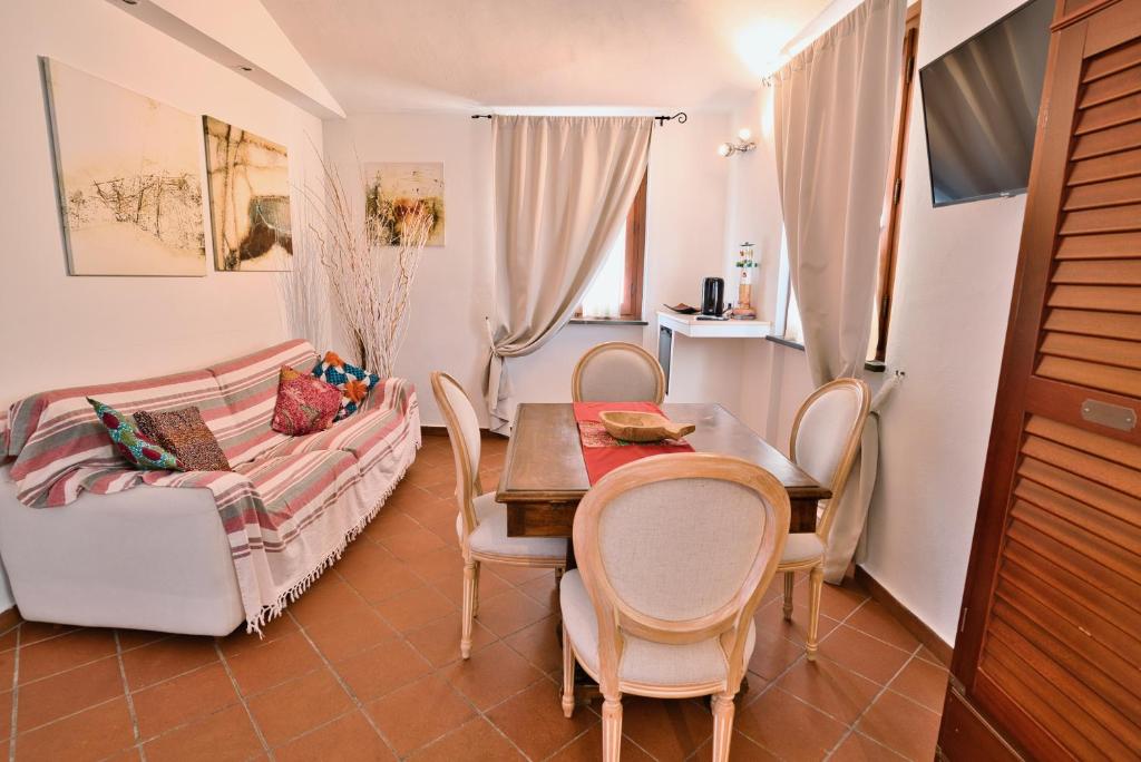 TV a/nebo společenská místnost v ubytování Il Saracino boutique suites