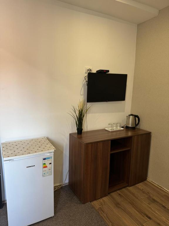 Kuchyň nebo kuchyňský kout v ubytování Apartments and Rooms L E F T RIVER Belgrade