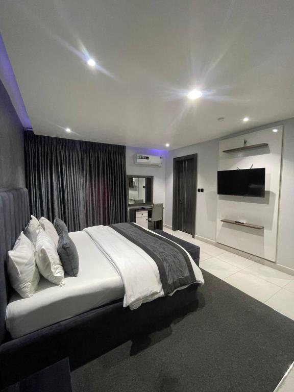 TV a/nebo společenská místnost v ubytování Alluvia Residences