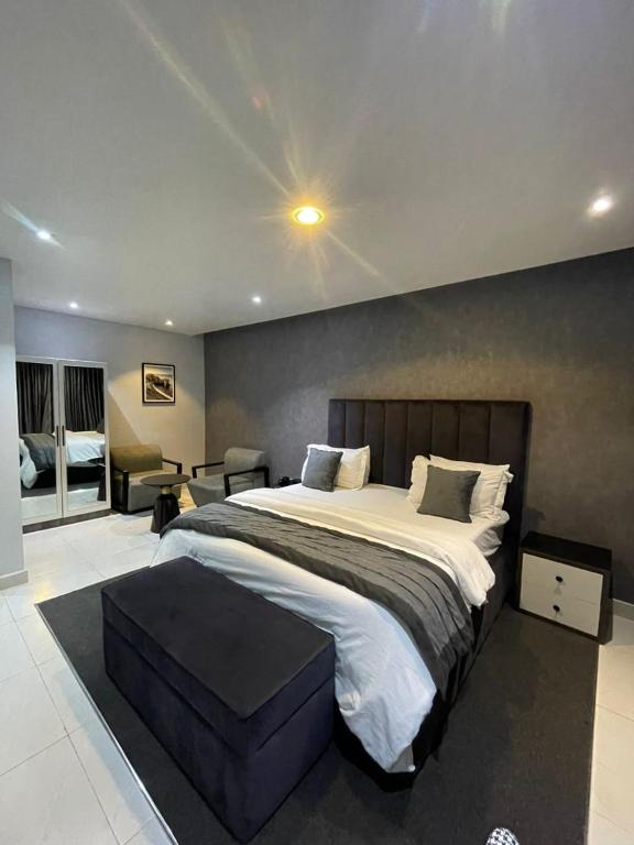 Postel nebo postele na pokoji v ubytování Alluvia Residences