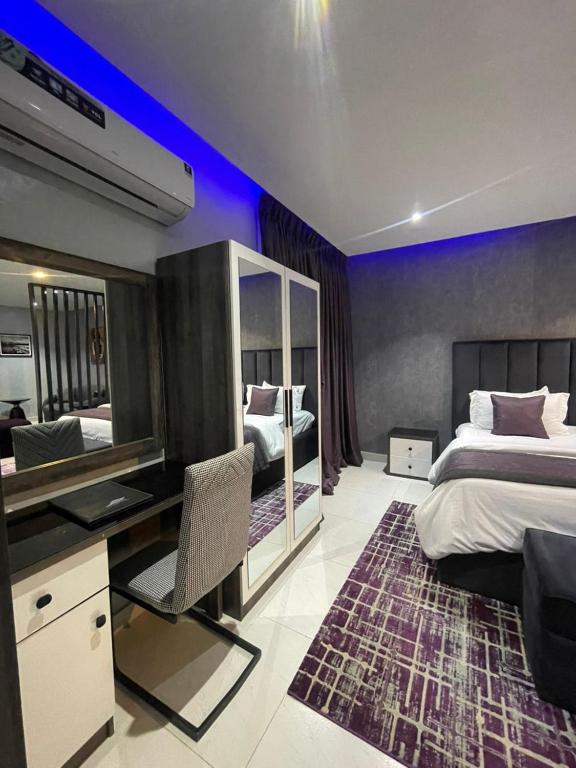 Postel nebo postele na pokoji v ubytování Alluvia Residences