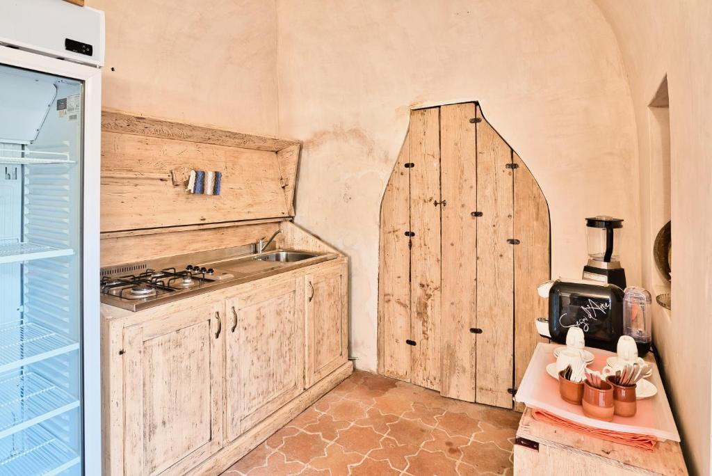 Kuchyň nebo kuchyňský kout v ubytování Il Saracino boutique suites