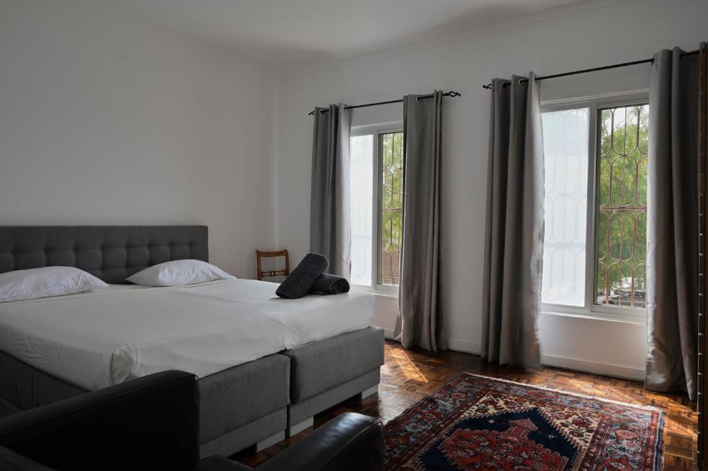 Postel nebo postele na pokoji v ubytování Casa Estrela - Sea & Art Guesthouse