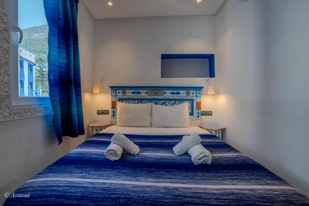Postel nebo postele na pokoji v ubytování Hotel Miramonte