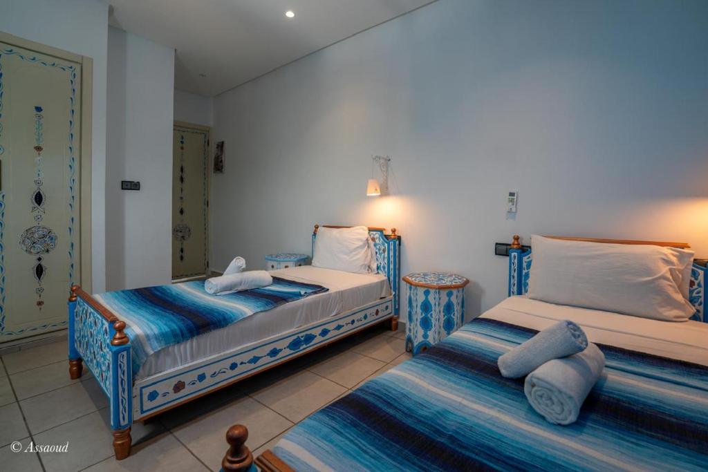 Postel nebo postele na pokoji v ubytování Hotel Miramonte