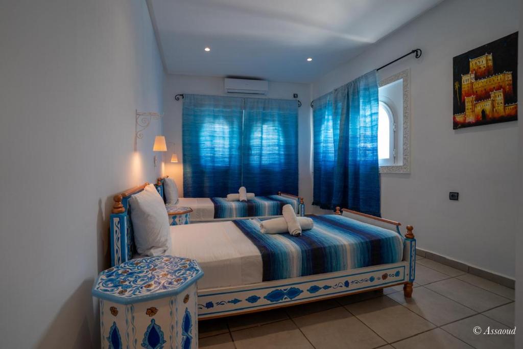 Postel nebo postele na pokoji v ubytování Hotel Miramonte