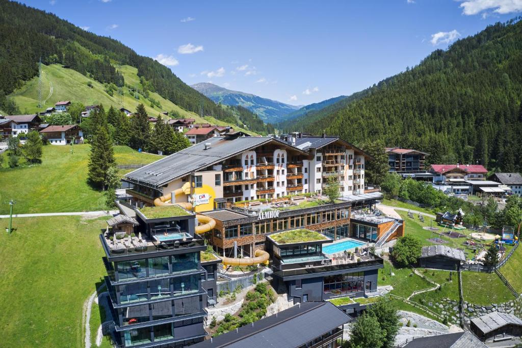 an aerial view of a resort in the mountains at Almhof Family und Wellness Resort in Gerlos