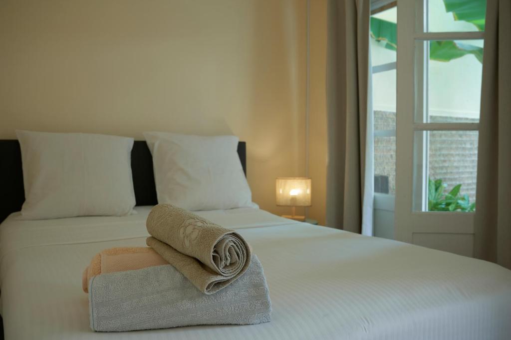 Postel nebo postele na pokoji v ubytování Casa Estrela - Sea & Art Guesthouse