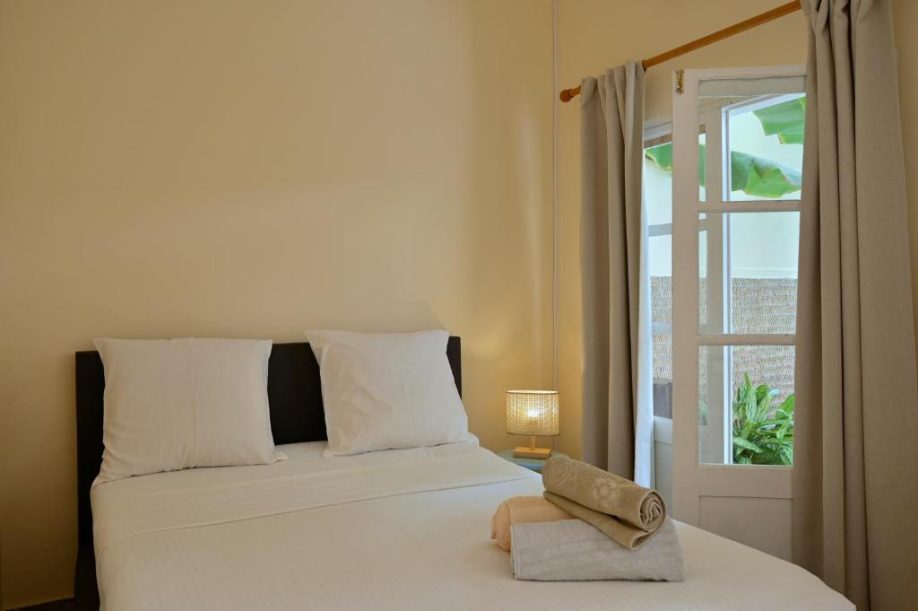 Postel nebo postele na pokoji v ubytování Casa Estrela - Sea & Art Guesthouse