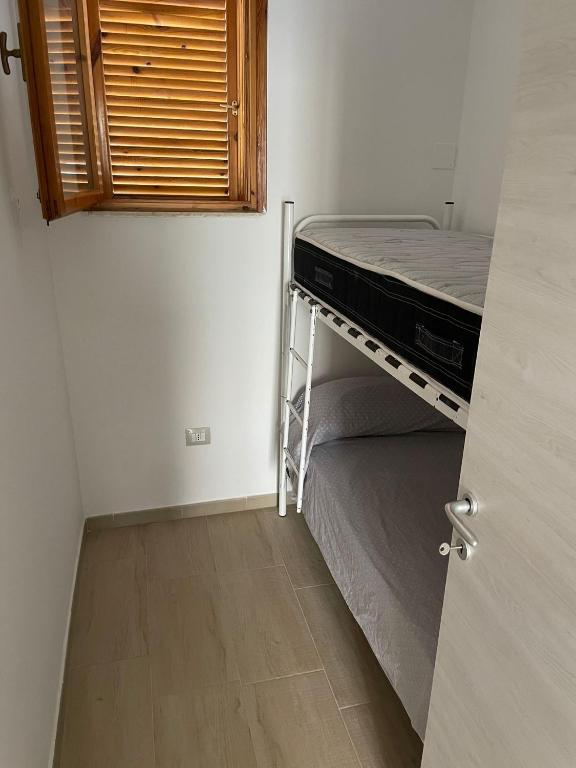 Postel nebo postele na pokoji v ubytování Casa Mareblu