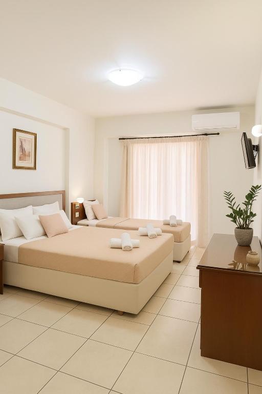 Postel nebo postele na pokoji v ubytování Hotel Vizantio