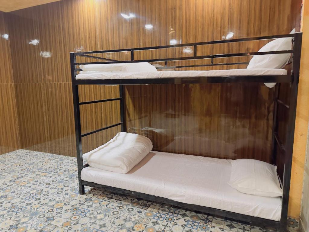 Ένα ή περισσότερα κρεβάτια σε δωμάτιο στο City Space Inn Hostel