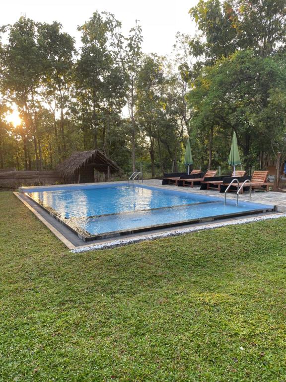 Bazén v ubytování Ayubowan Nature Cottage nebo v jeho okolí