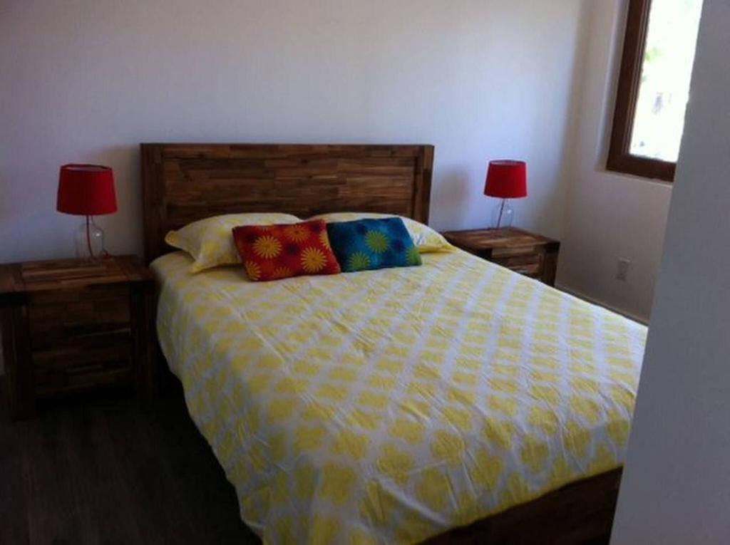 Postel nebo postele na pokoji v ubytování Gemini Villas , Gemini II