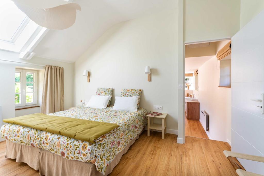 Postel nebo postele na pokoji v ubytování B&B Clerval - Maison d'hôtes et Gîtes