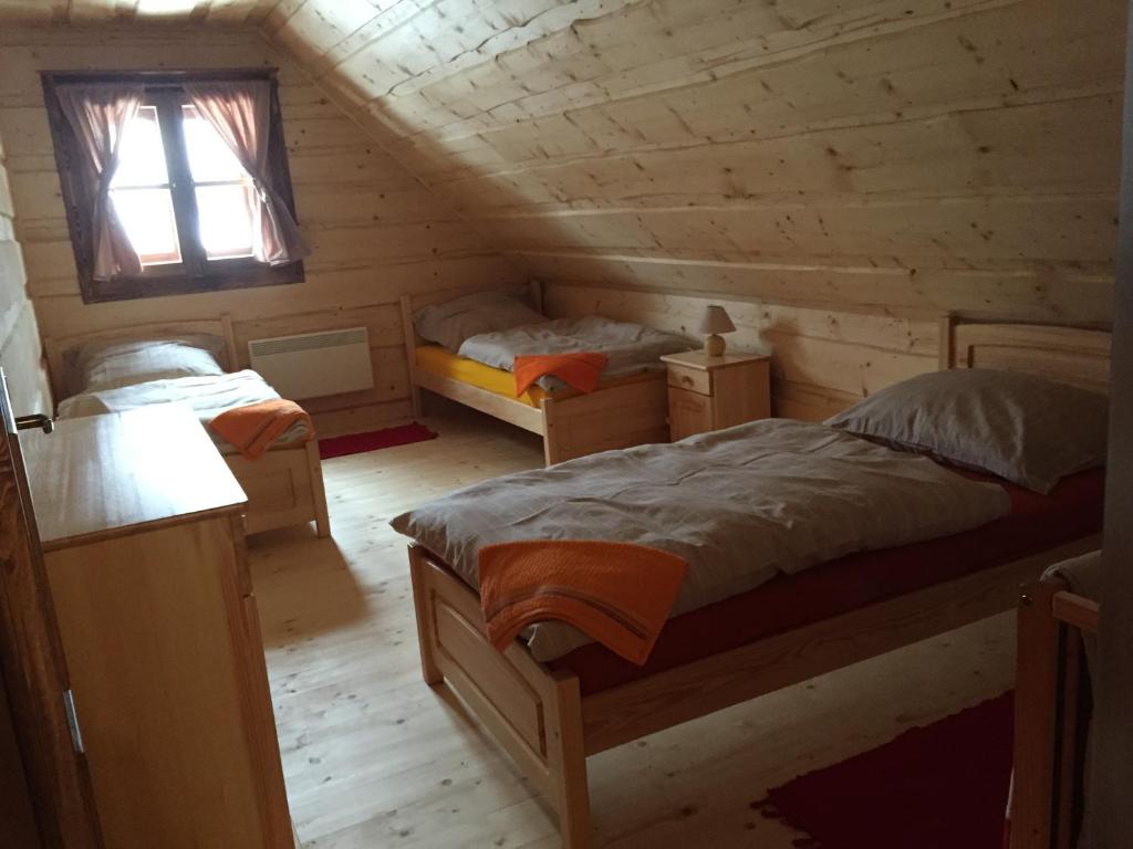 Postel nebo postele na pokoji v ubytování Drevenica u Michala