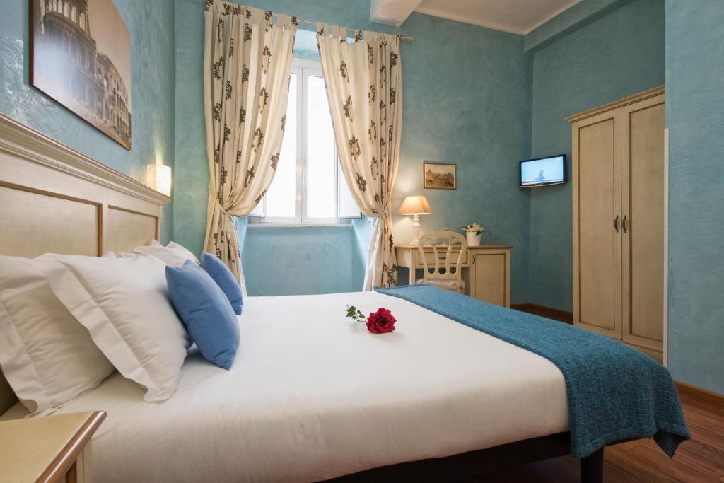 Postel nebo postele na pokoji v ubytování Navona Tower Relais