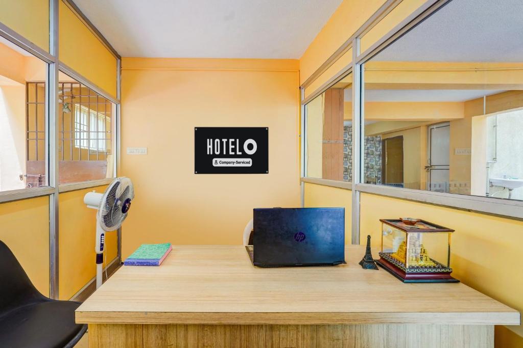 Posezení v ubytování Super Hotel O Velachery Near Devi Karumariamman Nagar Extension