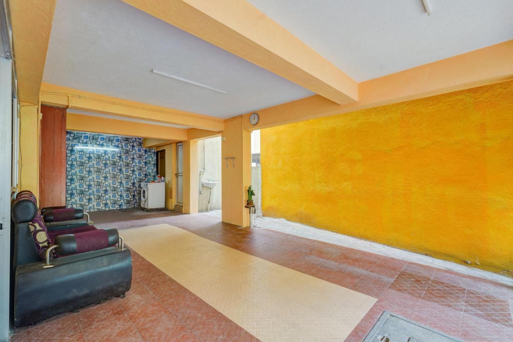 Posezení v ubytování Super Hotel O Velachery Near Devi Karumariamman Nagar Extension
