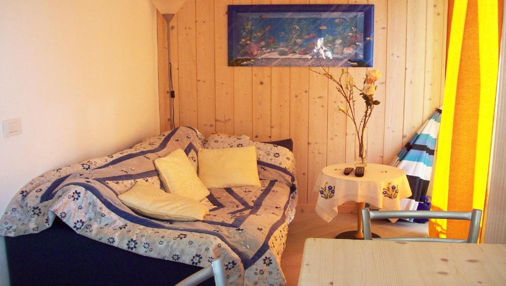 Postel nebo postele na pokoji v ubytování Casa delle Camelie