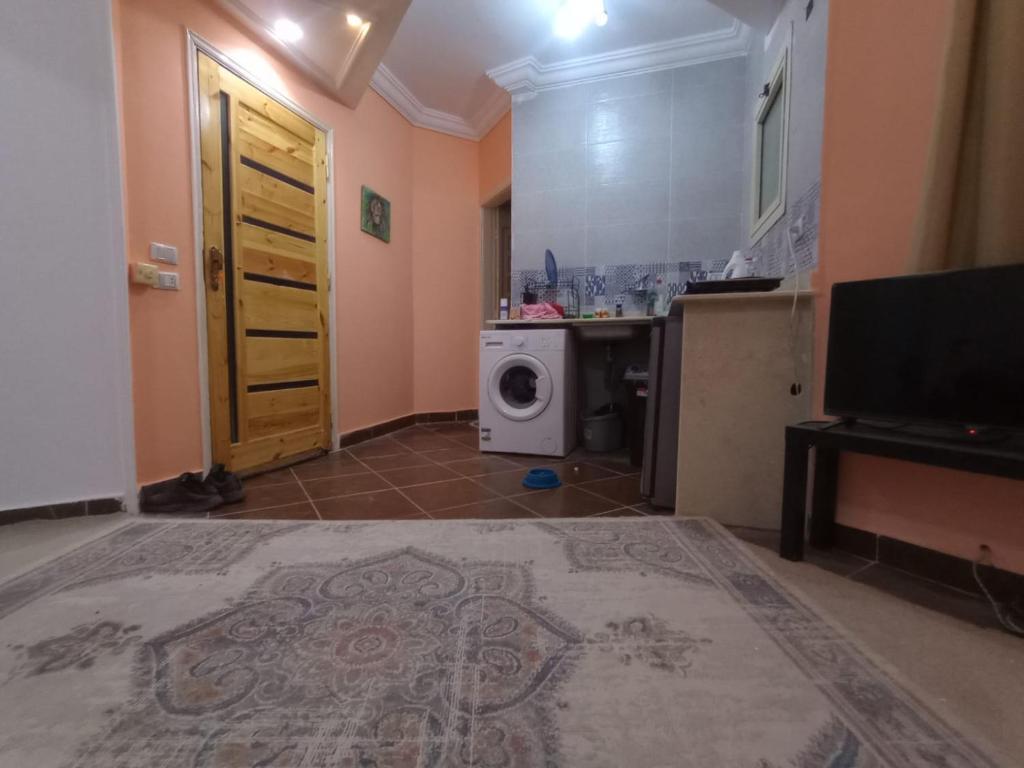 Kuchyň nebo kuchyňský kout v ubytování ALHASANI APARTMENT