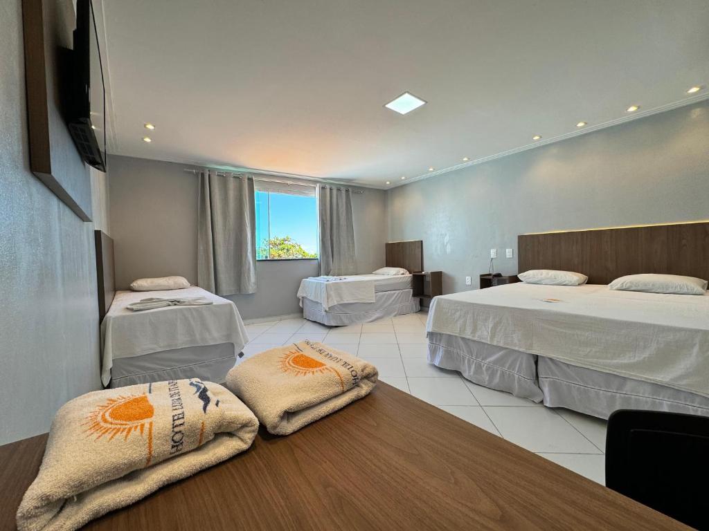 Postel nebo postele na pokoji v ubytování Hotel Luar de Itapua
