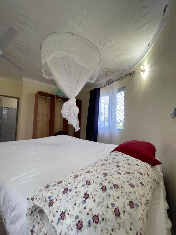 Ένα ή περισσότερα κρεβάτια σε δωμάτιο στο Diamond Sands Villa
