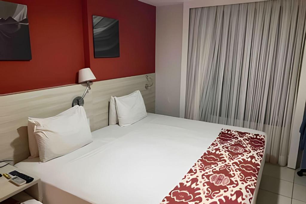 Postel nebo postele na pokoji v ubytování Natal, PontaNegra - Mar e Descanso