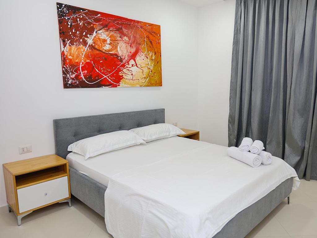 Postel nebo postele na pokoji v ubytování Hotel Adria