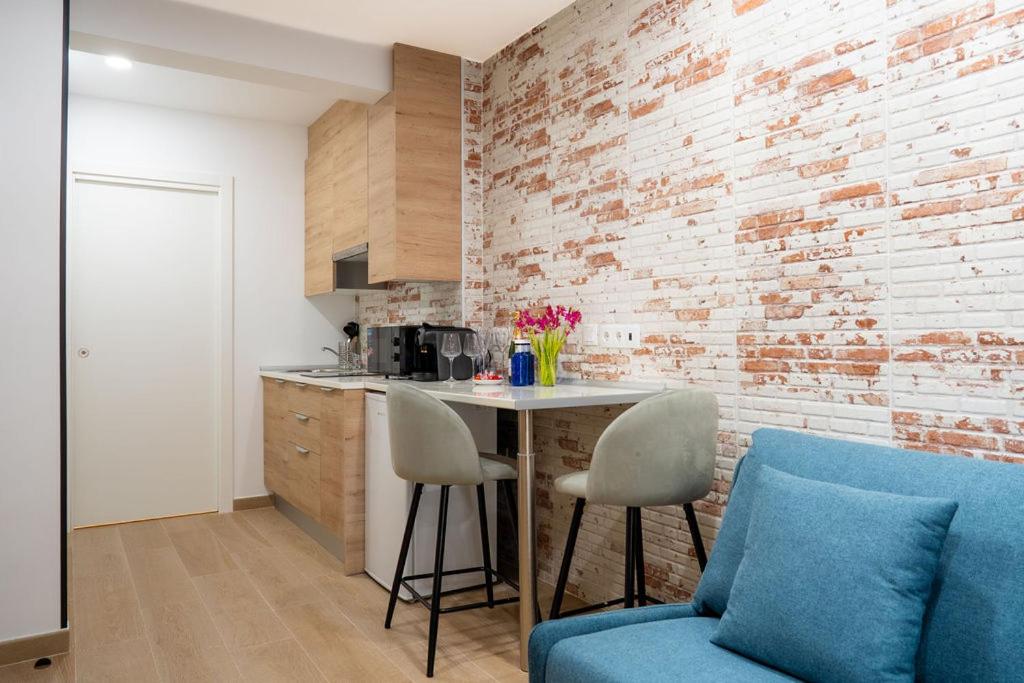 Kuchyň nebo kuchyňský kout v ubytování Emily Suites
