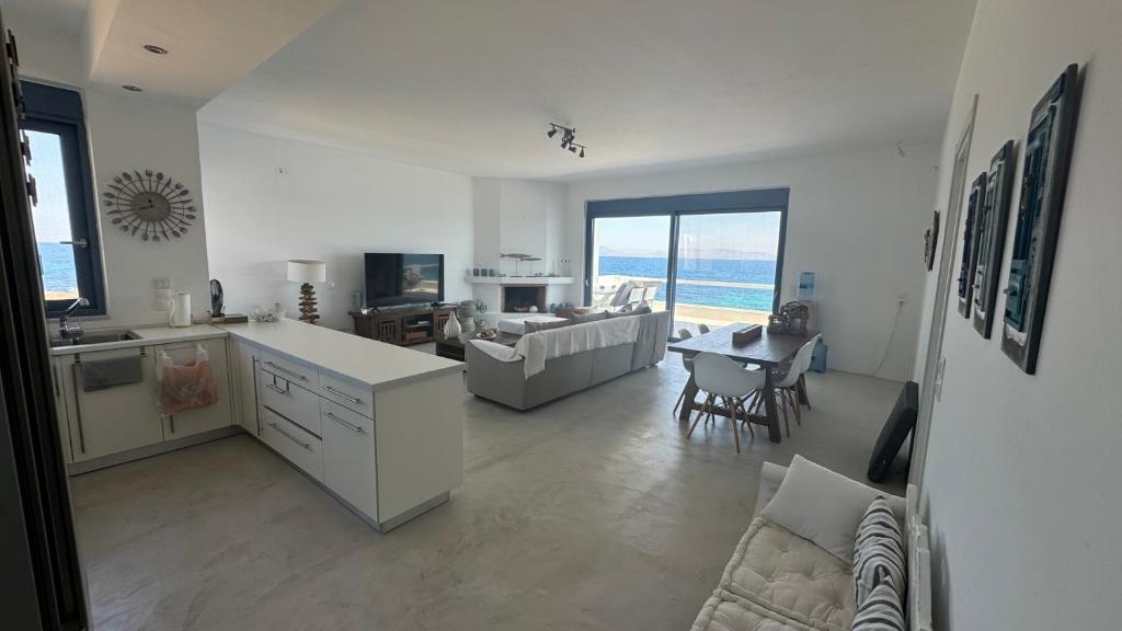 A television and/or entertainment centre at NV seafront Villa Aegina
