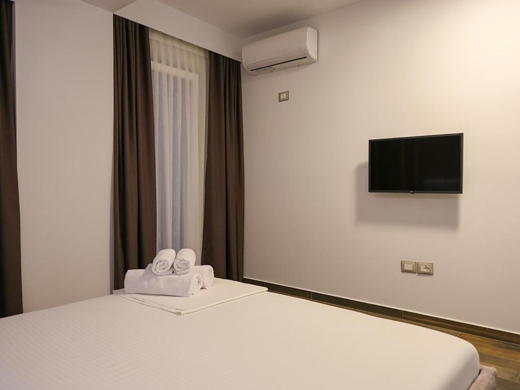 TV a/nebo společenská místnost v ubytování Hotel Adria