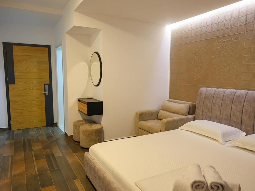 Postel nebo postele na pokoji v ubytování Hotel Adria