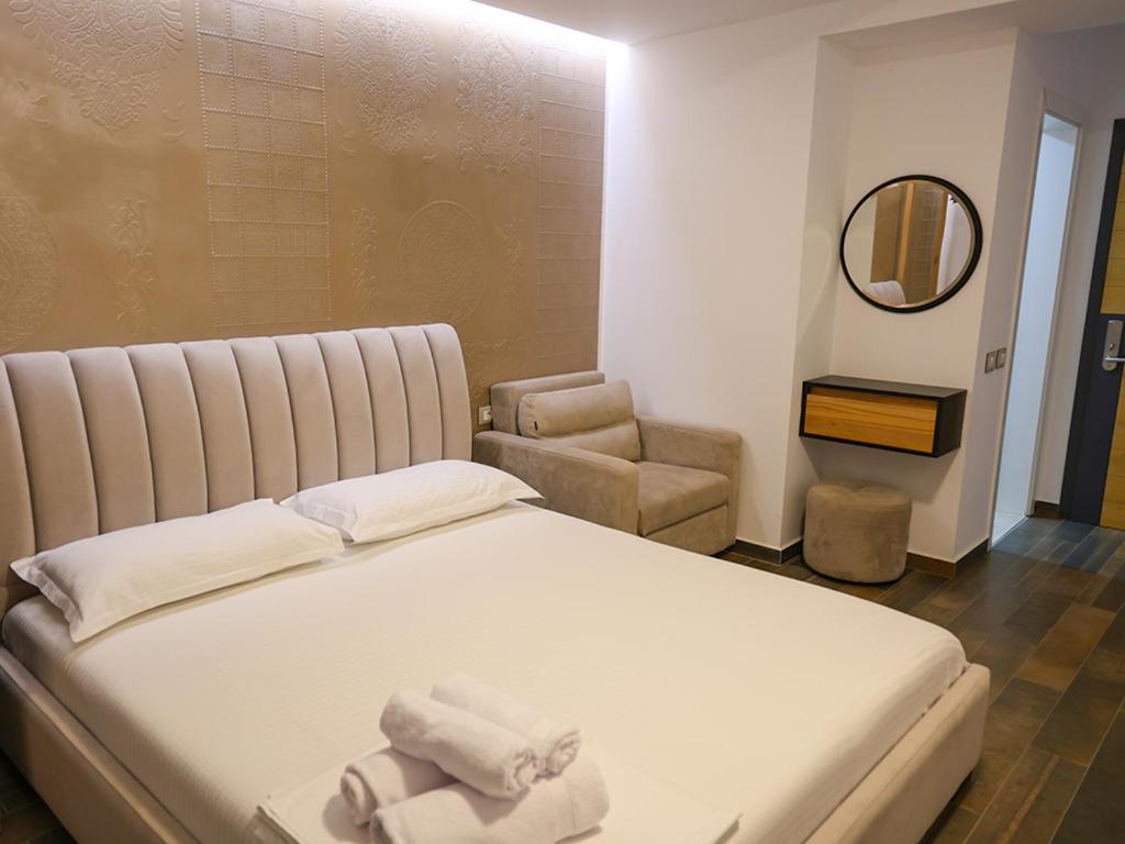 Postel nebo postele na pokoji v ubytování Hotel Adria