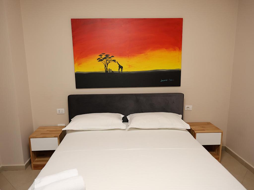 Postel nebo postele na pokoji v ubytování Hotel Adria