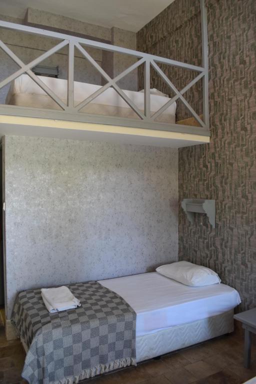 Postel nebo postele na pokoji v ubytování Likya Guest House