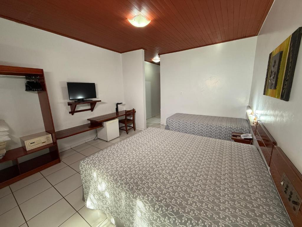 Cama ou camas em um quarto em Thermas diRoma Hotel Incluso o acesso ao Acqua park todos os dias, exceto no dia do check-out