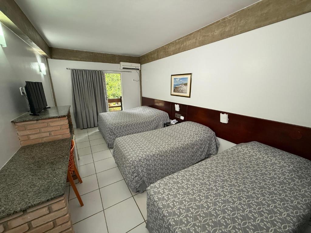 Cama ou camas em um quarto em Thermas diRoma Hotel Incluso o acesso ao Acqua park todos os dias, exceto no dia do check-out