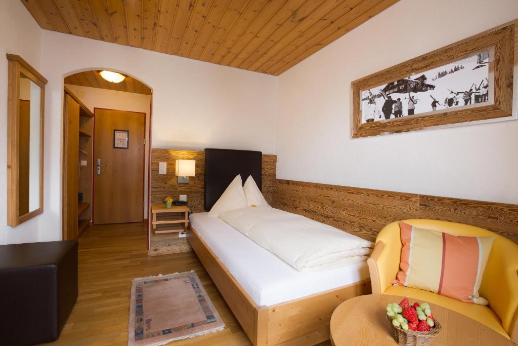 Postel nebo postele na pokoji v ubytování Hotel Edelweiss Superior