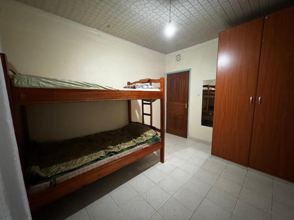 Postel nebo postele na pokoji v ubytování Tekas Housing - Ngong Hills