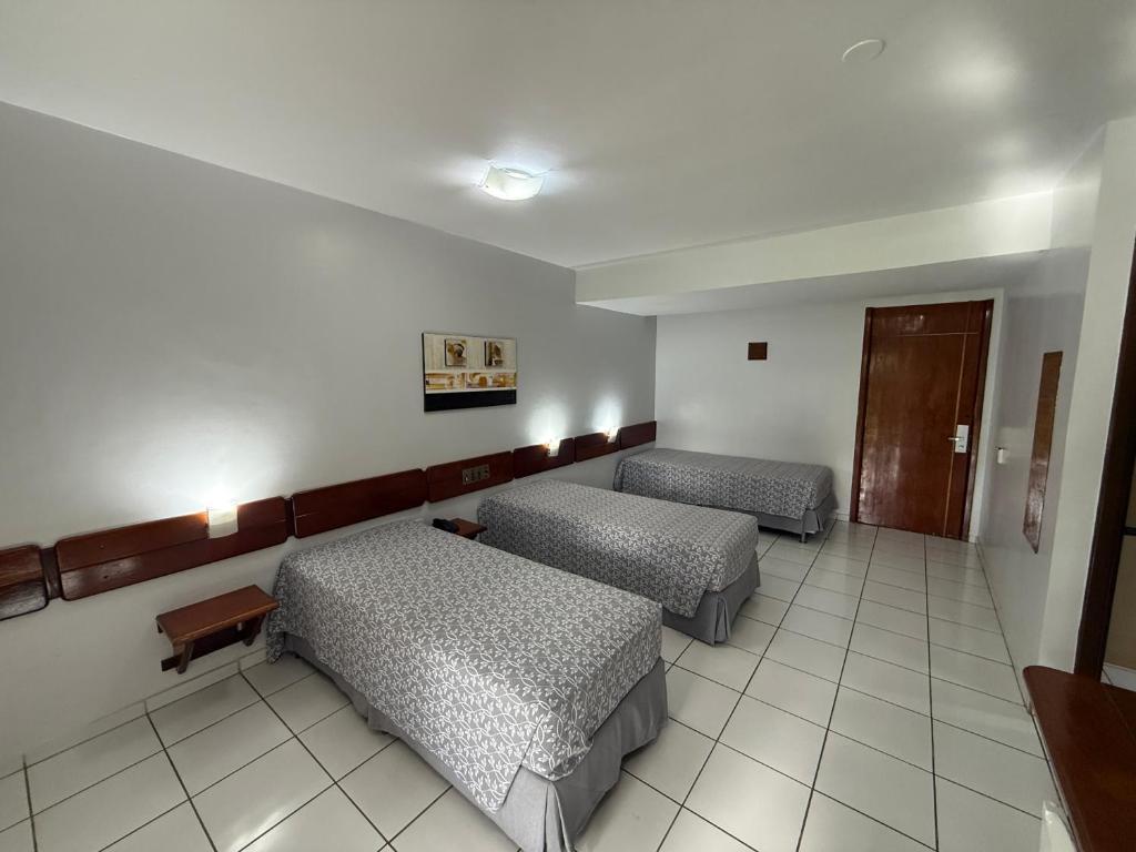 Cama ou camas em um quarto em Thermas diRoma Hotel Incluso o acesso ao Acqua park todos os dias, exceto no dia do check-out
