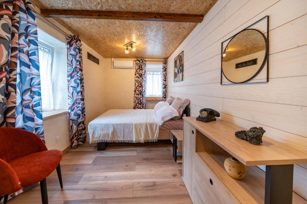 Llit o llits en una habitació de Les cols