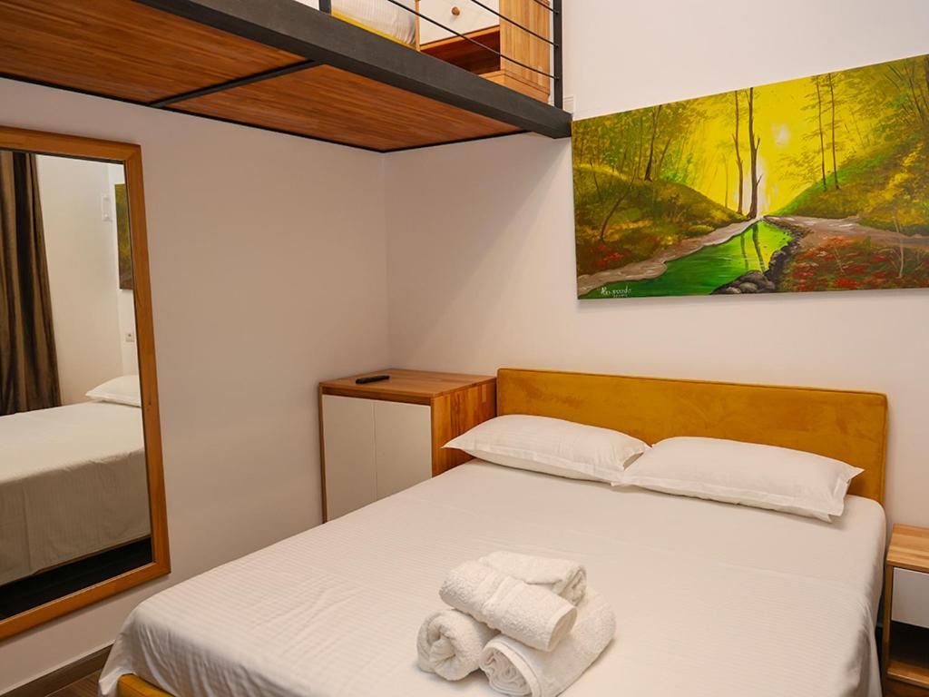Postel nebo postele na pokoji v ubytování Hotel Adria