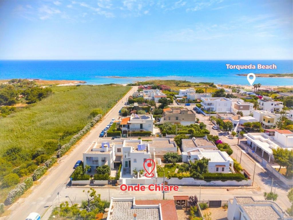 an aerial view of a resort with the ocean at Onde Chiare a 100metri da spiaggia solo sabbia in Torre Santa Sabina