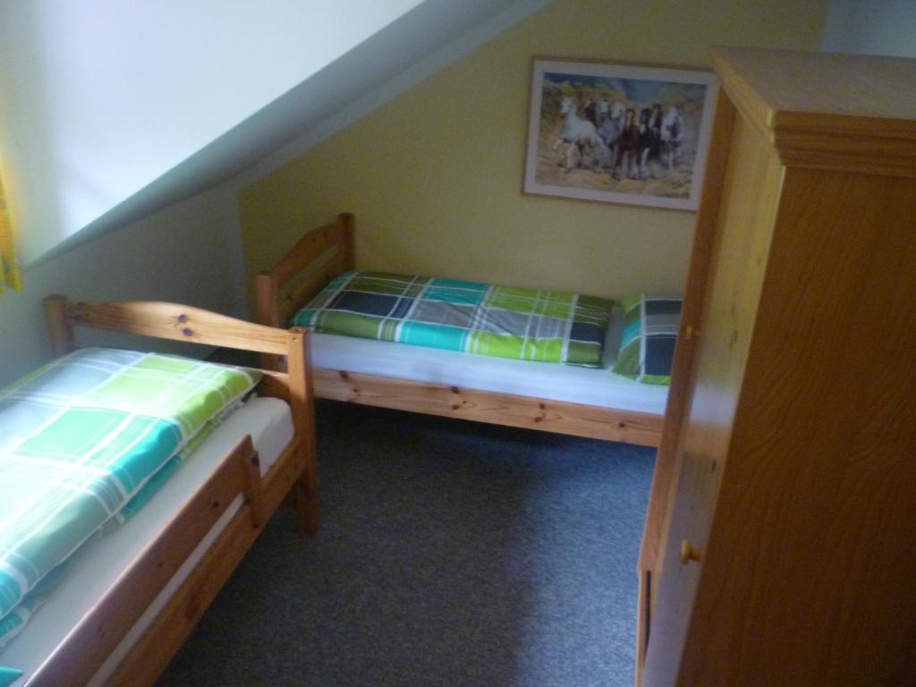 Postel nebo postele na pokoji v ubytování Schmiedbauernhof