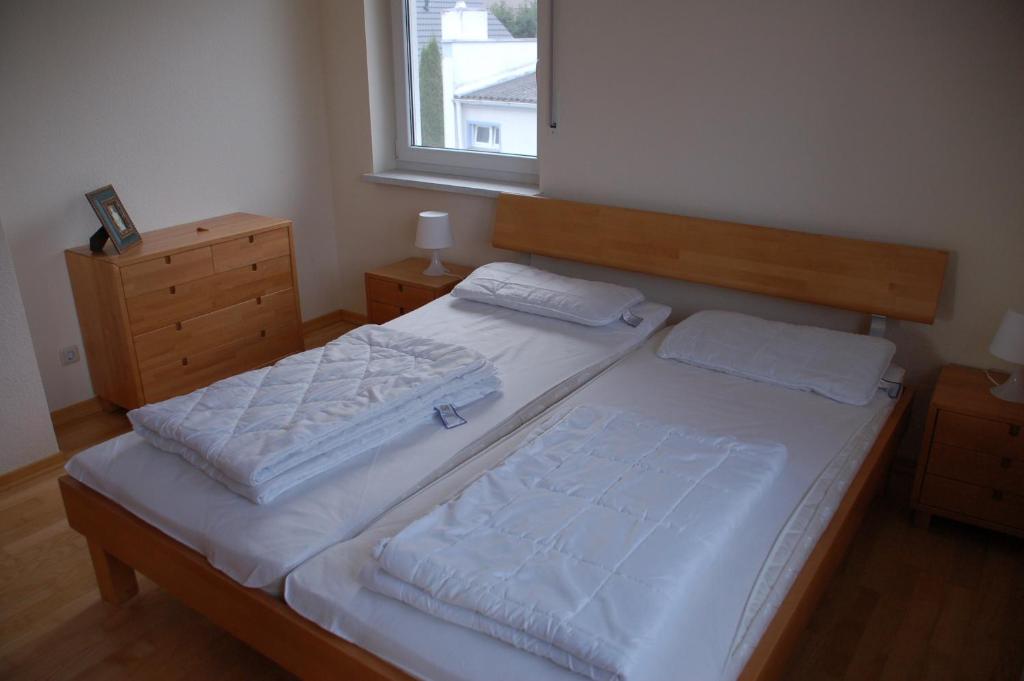 Postel nebo postele na pokoji v ubytování Haus Rechteck