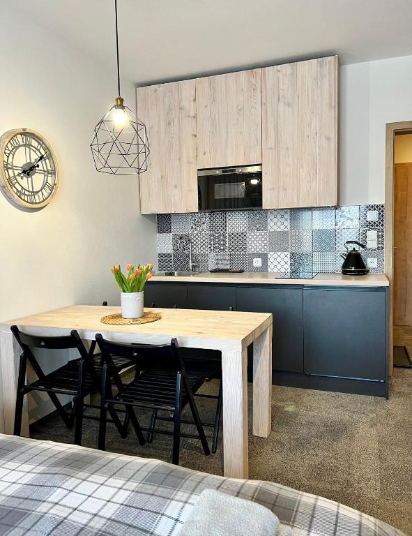 Kuchyň nebo kuchyňský kout v ubytování Apartmány na sjezdovce Dolní Morava